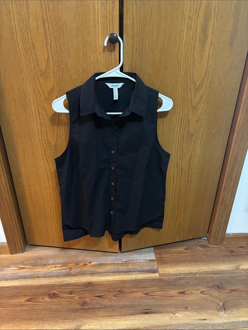 SPANX Black Sleeveless Button-Front Blouse